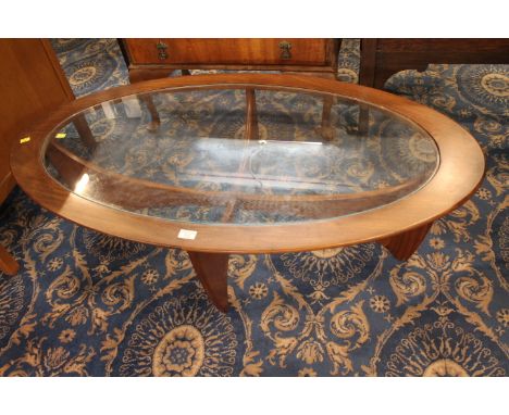 Mid century Ercol oval glass coffee table