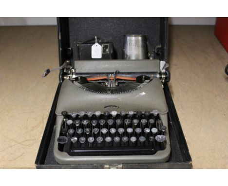 Remington typewriter, vintage camera, tankard and Lord Nelson Trafalgar tankard