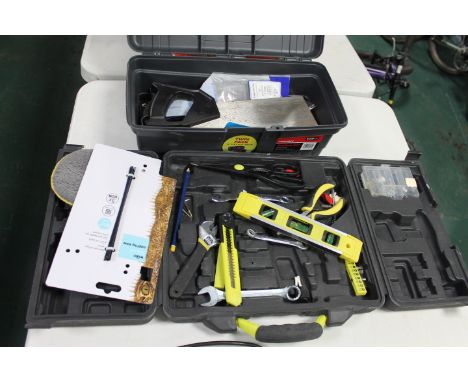 Two plastic toolboxes and small hand tools