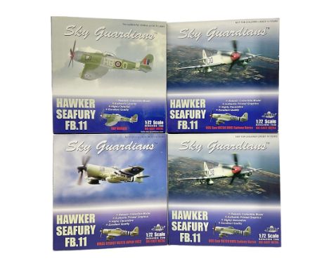 Four 1:72 scale model airplanes comprising Skyguardians ‘Hawker Seafury’ models RAF WH589, two 805 Sqn VX730 HMS Sydney Korea