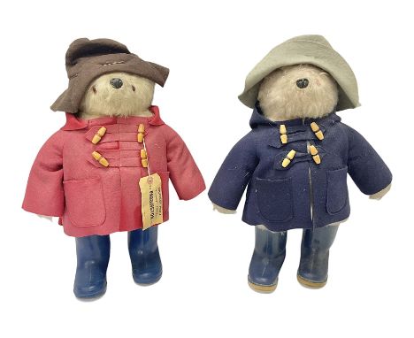 Pair of Paddington Bear teddies with amber eyes, the first example having a brown felt hat, red coat and blue PB boots with o