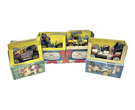 Schuco - four boxed Old Timer series tin-plate model cars comprising two 1228 Opel Doktor-Wagen 1909, one in yellow and anoth