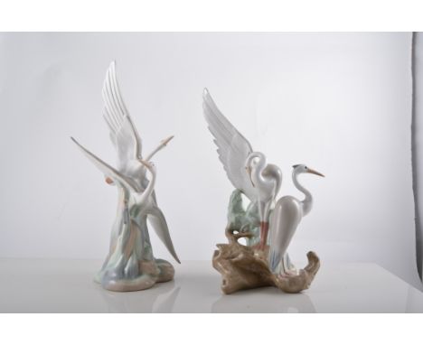 Two Nao porcelain models of cranes, on circular pedestals (2).