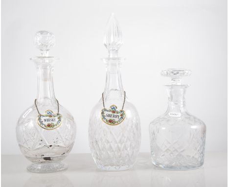 Six crystal decanters, Thomas Webb, Edinburgh, and another plain glass decanter of sporting interest, with two Coalport label