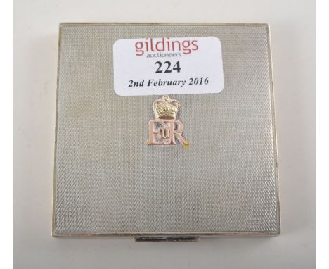 Silver square engine turned powder compact with "E.R." raised letters to top, 3".  Hallmarked with Coronation mark for London