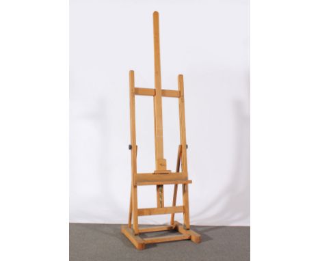 Beechwood artists studio easel, and two metal folding easels, (3).