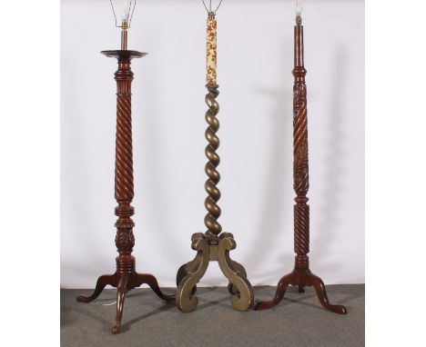 Mahogany standard lamp, leaf carved and wrythen fluted column, tripod base with shade, height overall 180cm, another mahogany