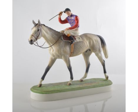 Royal Worcester porcelain Equestrian model, The Winner, modelled by Doris Lindner, hardwood plinth, height overall 28cm.