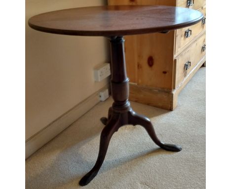 A 19th century mahogany tripod table.
