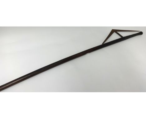 A Zulu Axe with angled and twist stem blade, length 115cm.