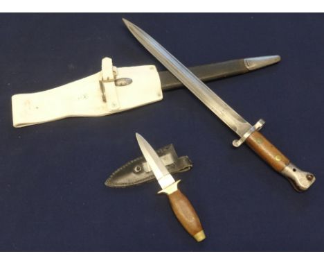 A Wilkinson bayonet and scabbard, also a small dagger and sheaf, with Sheffield blade (2).