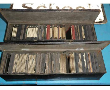 A good collection of mixed Victorian Magic Lantern slides, in two tin boxes, approx 150 slides