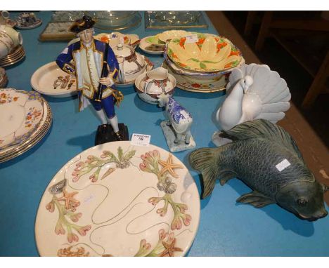Five mixed ceramic items including Royal Worcester Admiral, Pottery Carp, Lladro dove, Delft cow and Angela Wallwork plate