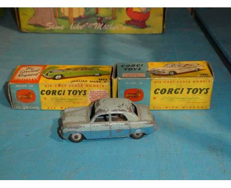 A vintage Corgi Toys 238 Jaguar Mark X in maroon finish with original box together with a Corgi Toys 419 Ford Zephyr Motorway