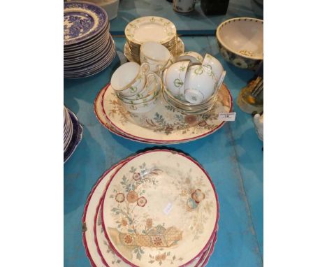 A white and green garland pattern tea service for eight places and six Victorian pottery plates in Hampton design
