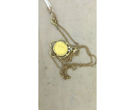 A 1/10 oz Krugerrand in diamond set pendant on a 9ct chain