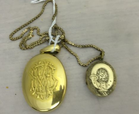 An 18ct gold oval pendant on a 9ct gold chain