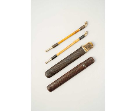 TWO JAPANESE KISERUZUTSU (PIPE CASES), AND TWO KISERU (PIPES)MEIJI OR LATER, 19TH/20TH CENTURYBoth lacquer cases of muso-zuts
