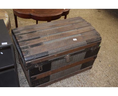 Vintage steamer trunk with applied metal panelling