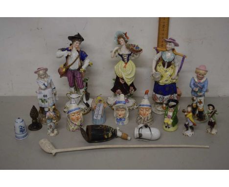A group of ceramics to include Royal Worcester figural candle snuffers, continental figurines, cley pipes etc