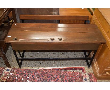 A vintage metal and hardwood double school desk