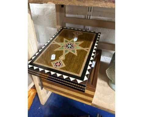 A hardwood chess set together with a modern inlaid backgammon board