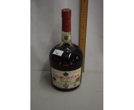 A bottle of Courvoisier Three Star Luxe Cognac 2PT 8floz