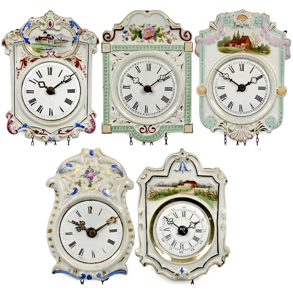 5 Black Forest Porcelain Shield Clocks, c. 1880 2 small (Jockele) and 3