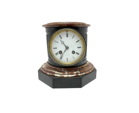 French - 8-day Belgium slate mantle clock c 1870, circular slate case with a incised carving to the sides on a hexagonal slat