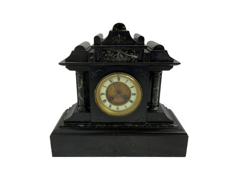 French- late 19th century Belgium slate 8-day mantel clock, with a shaped pediment and break front case with recessed Mable c