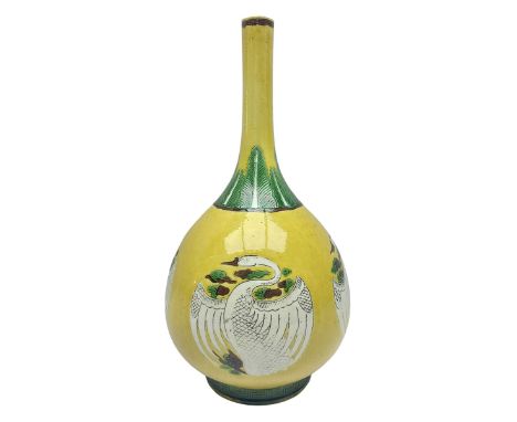 Chinese famille jaune bottle vase, probably late 19th/early 20th century, the body decorated with swans amongst clouds, with 