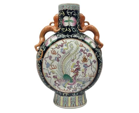 20th century Chinese moon flask, with twin lizard handles, the body with floral and foliate decoration in polychrome enamels 