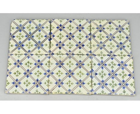 Lot of 32 antique tiles with floral/arrow motif. 19th century. Dimensions: 13 x 13 cm. In good condition.