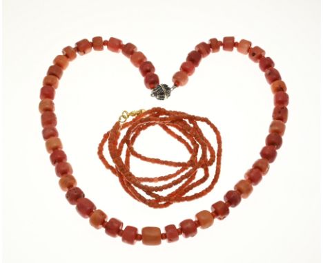 Two coral necklaces. Necklace of 2 rows of blood coral, ø 3.1 mm. attached to a double lock, length 50 cm. approx. 17.5 grams