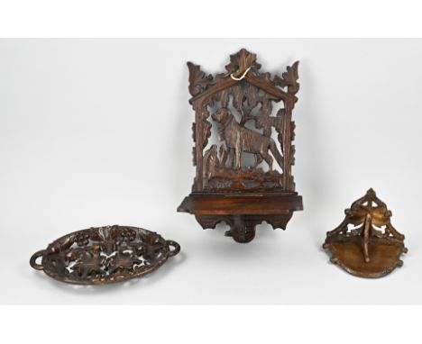 Three parts antique Black Forest carving. Consisting of: 1x Console. 1x Openwork bowl. 1x Large wall-etagere with Bernese Mou