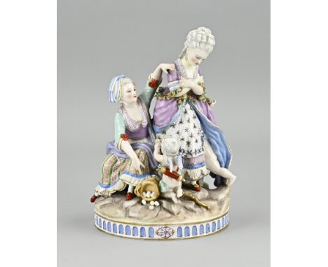 Early 19th century porcelain figurine group with base mark (blue cross mark with dots). Cupid with bow with two ladies. Few r