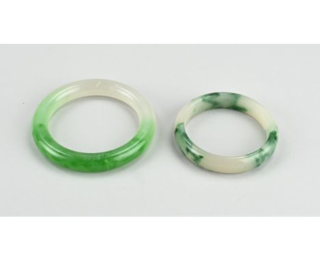 Two old Chinese bracelets of jade. Size: Ø 7.3 - 8.7 cm. In good condition.