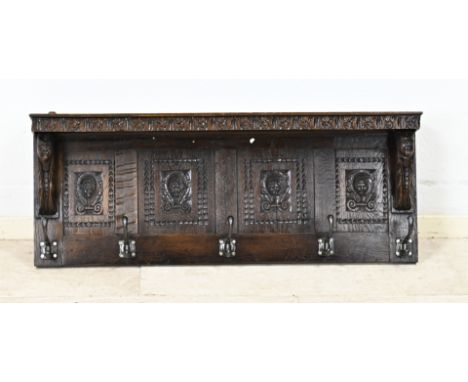 Antique Dutch oak carved coat rack. Circa 1900. Dimensions: 88 x 15 x 34 cm. In good condition.