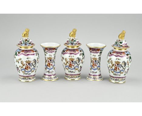 Five-piece Samson porcelain cabinet set with floral + coat of arms decoration. 19th century. One lidded vase has rim damage. 
