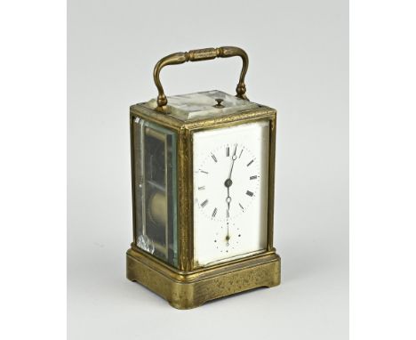 Antique French travel clock with striking mechanism on bell, with two hammers. Circa 1880. Facet cut glass damaged. Escapemen