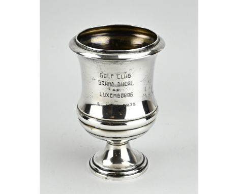Silver goblet, 900/000, on a round foot with fillet edge. The goblet is provided with an engraving: GOLF CLUB GRAND DUCAL de 