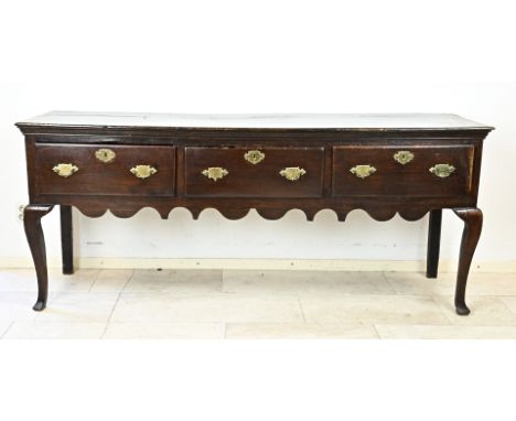 18th Century English Georgian side table with three drawers, original bronze fittings and queen Anne legs. Beautiful patina. 