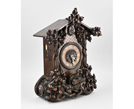 Antique Black Forest cuckoo clock in walnut. Table clock with lyre-shaped brass movement. Circa 1870. Dimensions: H 48 cm. In