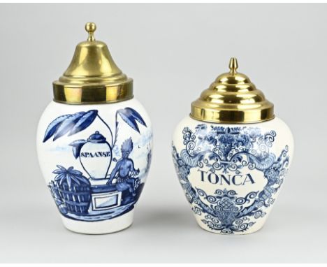 Two old/antique Dutch faience tobacco jars. 1x Delft, marked 3 bells, 19th century. 1x Makkum, first half 20th century. Dimen