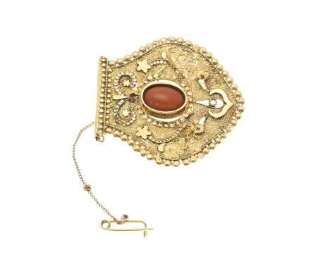Yellow gold brooch, 585/000, with blood coral. Brooch made from an end piece of an ear iron, decorated with a pearl edge and 