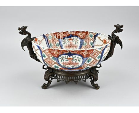 19th Century Japanese porcelain Imari bowl with bronze dragon fittings and claw feet. Dimensions: H 20 x Ø 24.5 cm. In good c