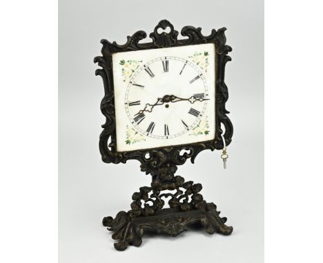 Antique cast iron night light clock with candle holder. Circa 1880. Hairline crack in glass dial, otherwise good. Size: 34 cm
