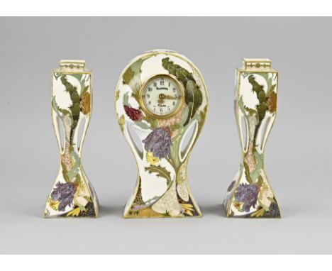 Rare three-piece Rozenburg The Hague eggshell porcelain Art Nouveau clock set with polychrome floral decoration. Circa 1900. 