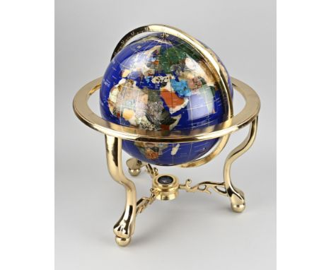 Large terrestrial globe, made of various types of gemstone, completely placed on a brass holder. 21st century. Dimensions: Ø 