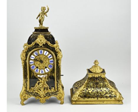 Antique French boulle clock on console. Circa 1850. Boulle inlay in moderate condition. Eight-day movement, half-hour strike 
